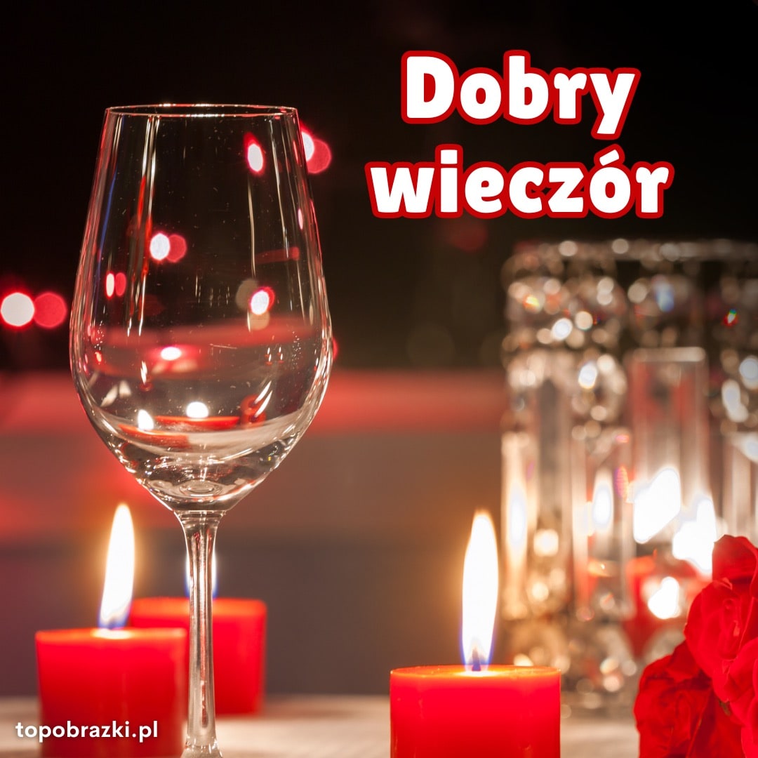 Kieliszek wina i zapalone świece na romantycznym tle z napisem 'Dobry wieczór'. Eleganckie życzenia na wieczór.