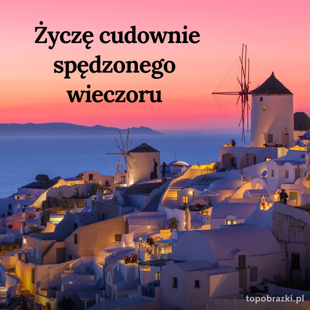 Zachód słońca nad Santorini z napisem 'Życzę cudownie spędzonego wieczoru'. Magiczne życzenia na wieczór.